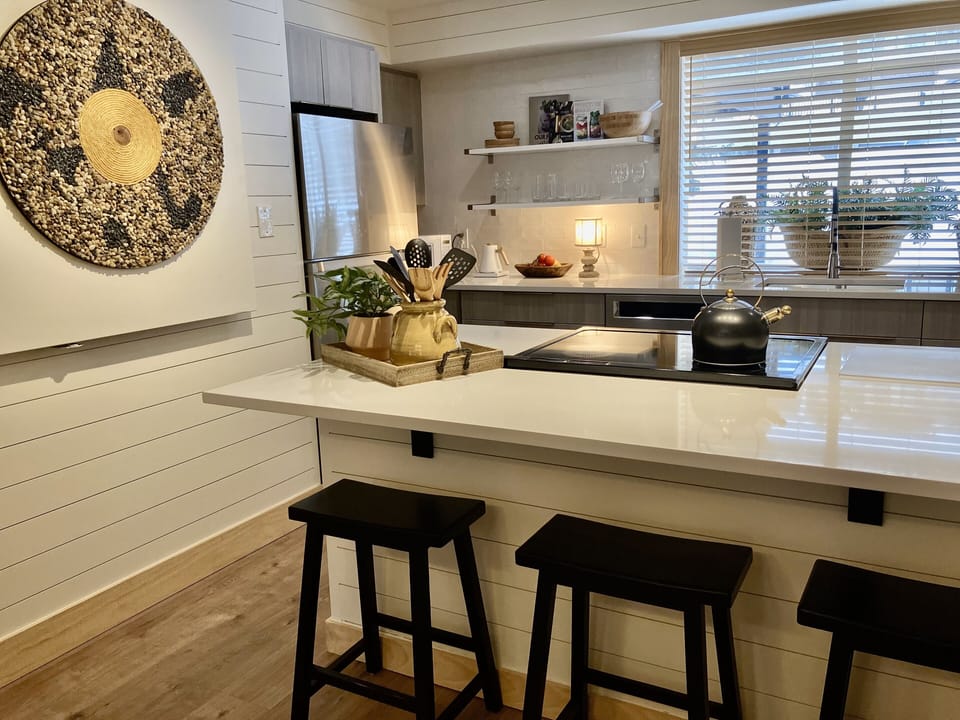Step into your modern kitchen with sleek quartz countertops, premium appliances, and thoughtful touches that make cooking feel like home.