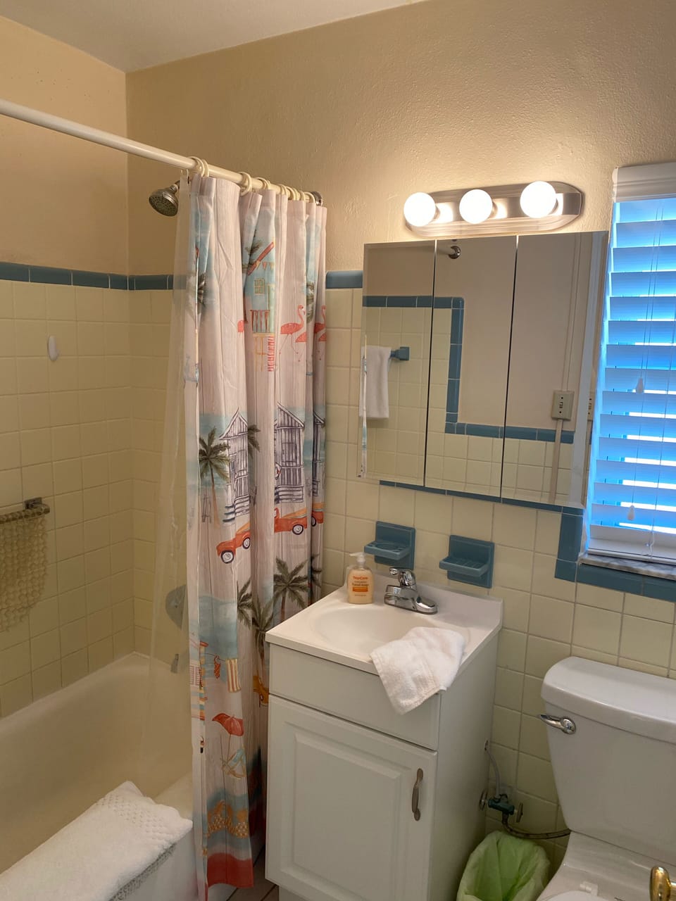 EVEN HAS A TUB BATH ...KEPT RETRO TILES FROM 50’s