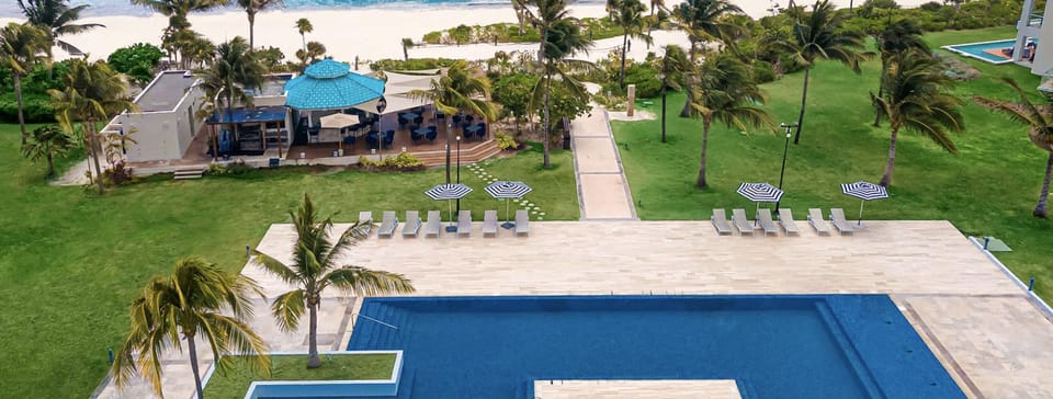 View of beach bar open for breakfast and lunch through 6pm.