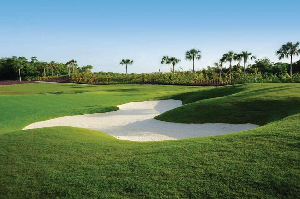 18-hole Pro golf course and driving range inside complex