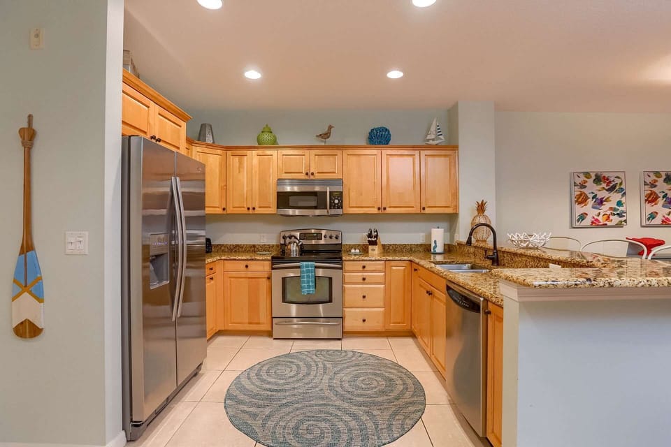 Fully Equipped, Gourmet Kitchen with Stainless Steel Appliances and Granite Countertops