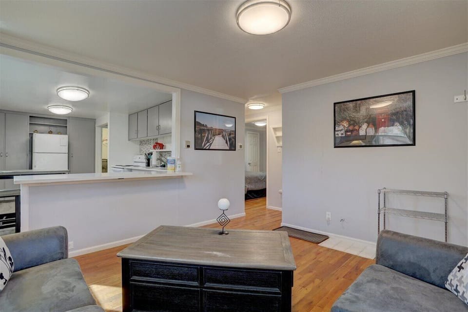 Front Living Room opens beautifully to large kitchen with breakfast bar.
