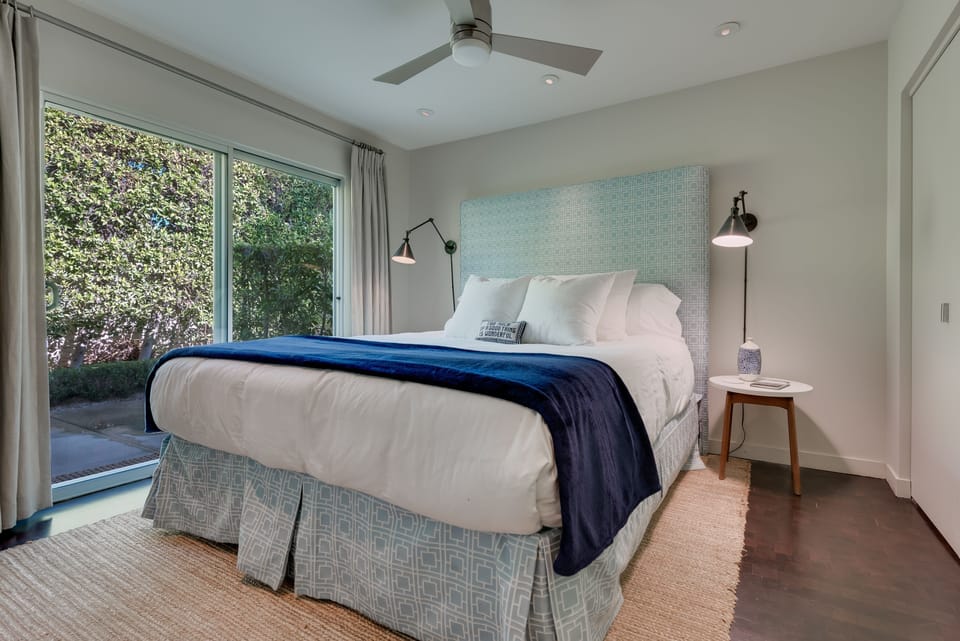 Guest Bed Two: King Bed, Door to Patio With Outdoor Shower