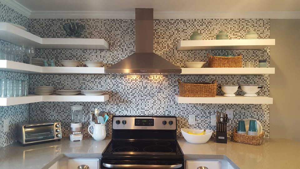 Our kitchen is modern and fully stocked for your convenience.