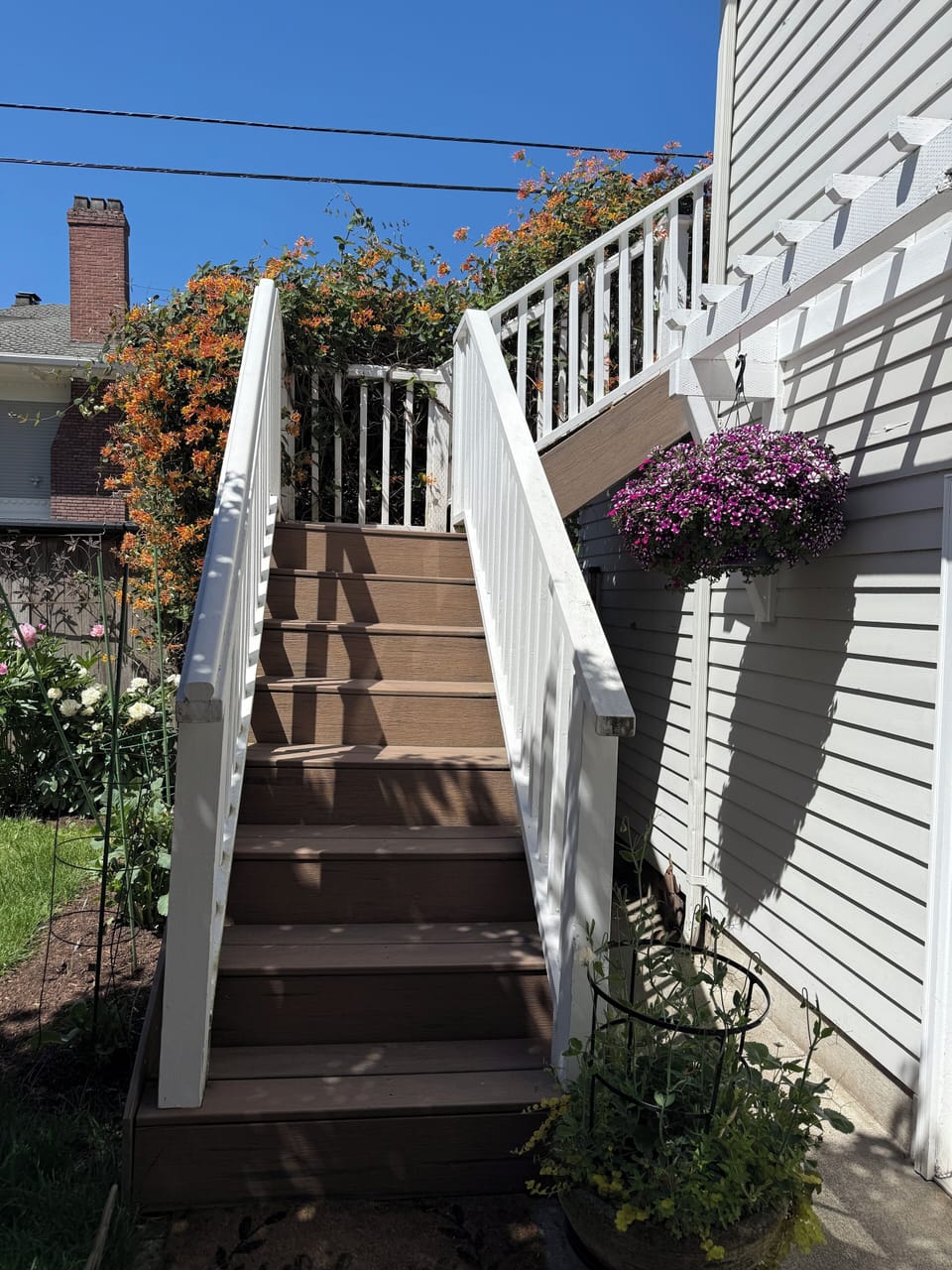 Stairs to private studio deck above the garage located on the back our property