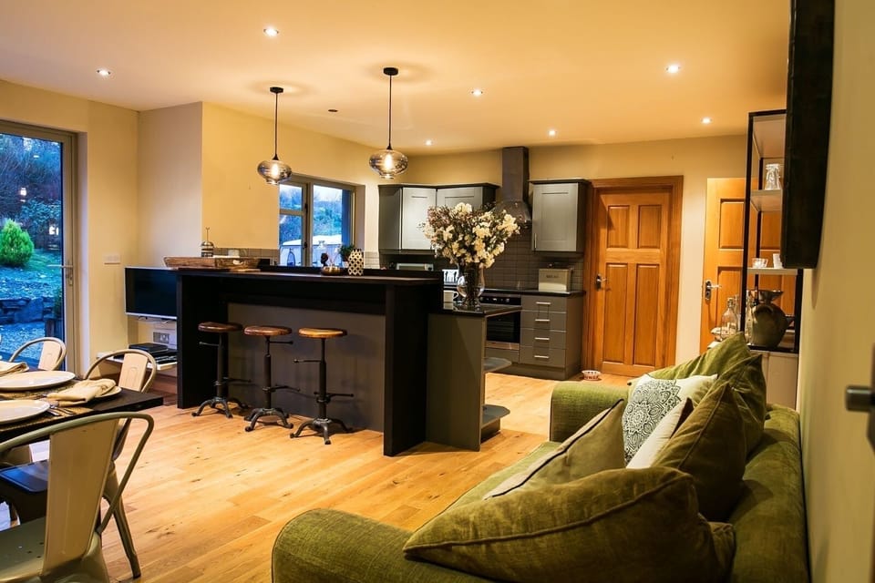 Kitchen/Dining space which opens out fully to the deck area