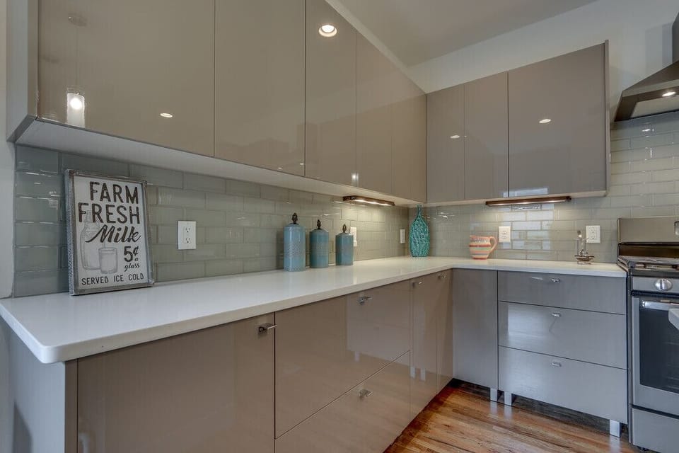 Plenty of cabinet space with imported cabinets from Italy. Soft touch close.  
