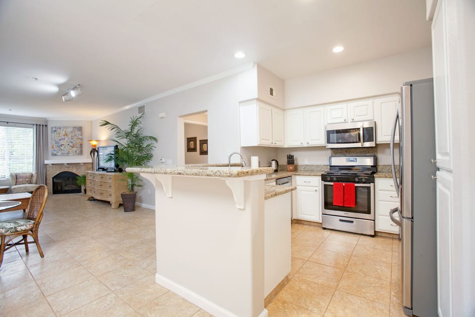 Gourmet kitchen, featuring new appliances