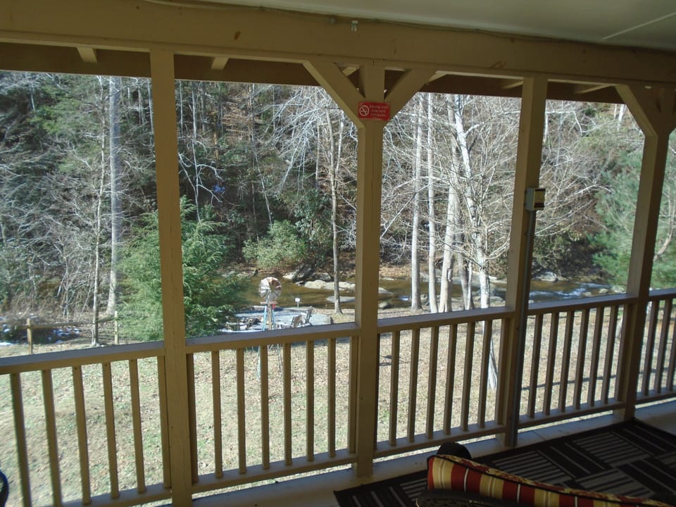 View from the porch. You can see, hear, and enjoy the creek & fire pit.