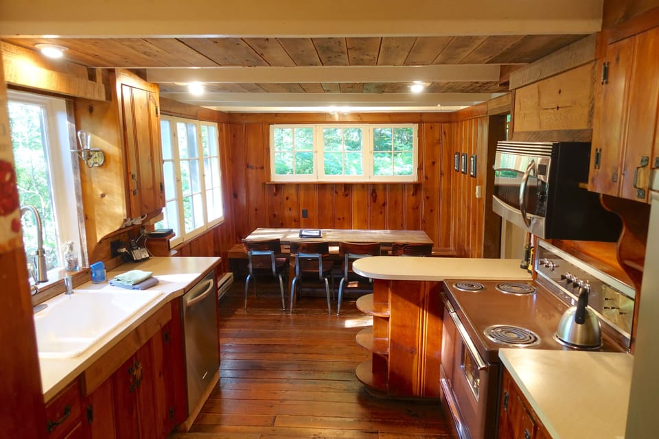 Kitchen table seats 8 comfortably.