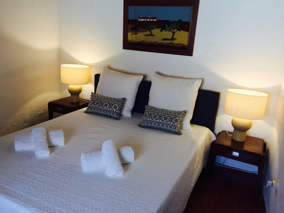 Room 3 has one double bed, a closet and a writing desk.