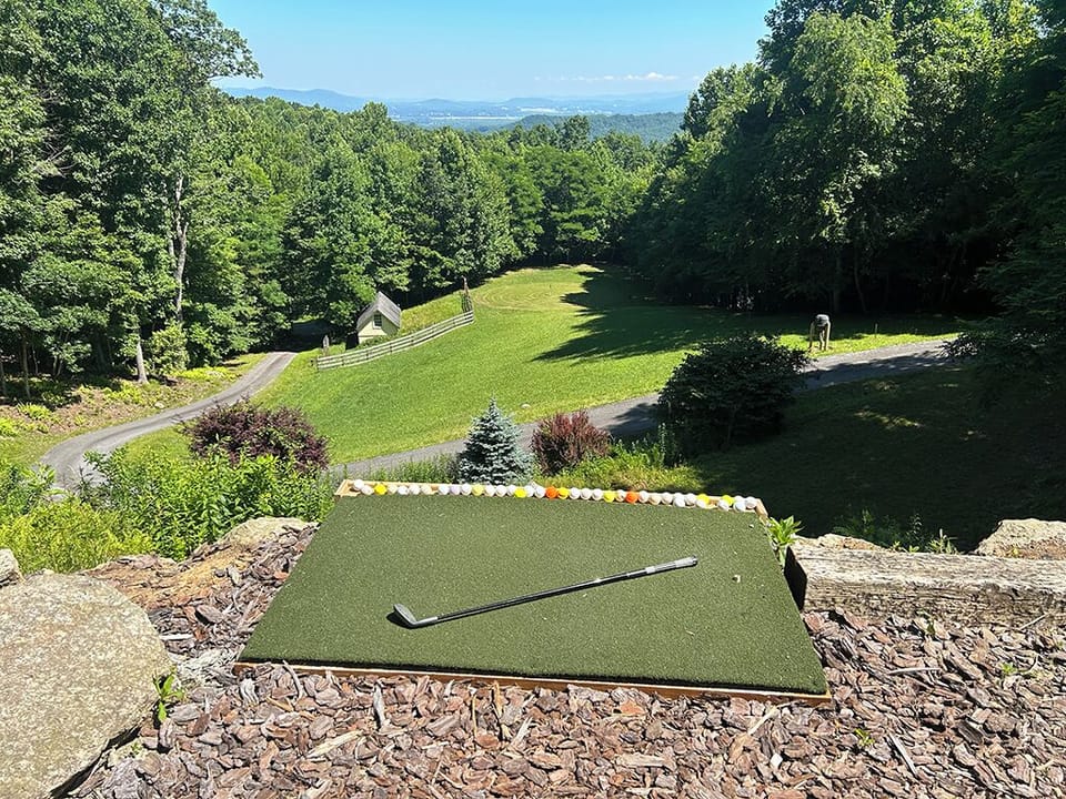 Hit a few golf balls on our private "driving range."