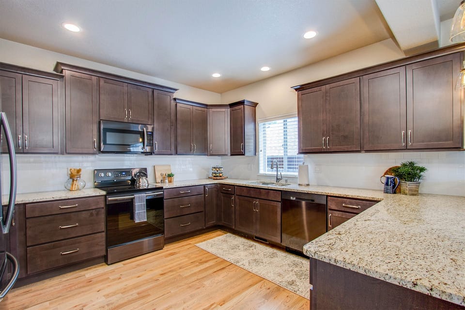 Storage abounds in large kitchen ready for a great meal