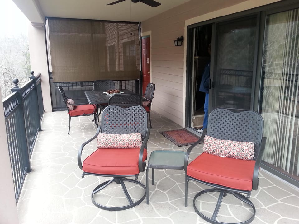 Semi private on back balcony, ceiling fan