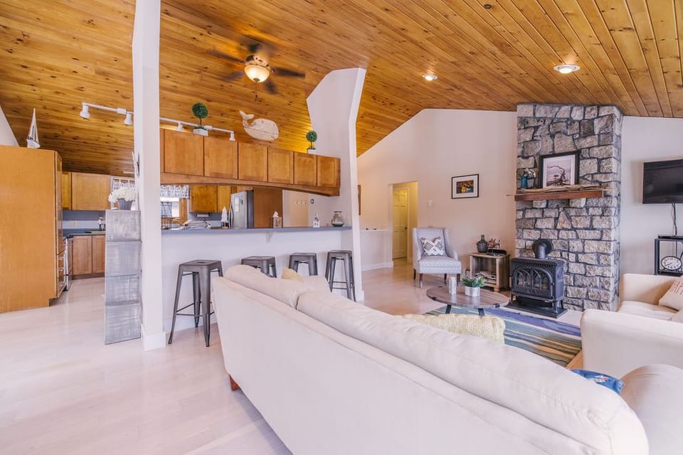 Open concept Living room, Kitchen and Dining room to the left in photo