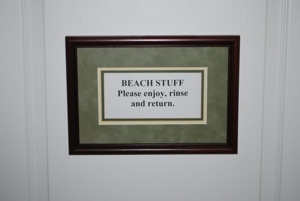 A closet full of beach toys, chairs, coolers and floats for your use. 