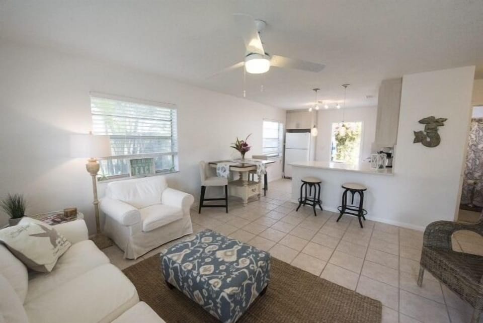 Breakfast bar opens to the kitchen or choose table top for more intimate dining.
