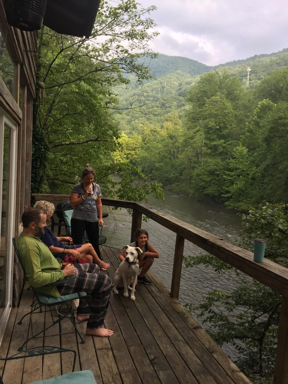 Relaxing on the deck over the river