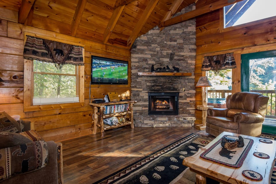 The Beautiful Living Room Has A Leather Reclining Chair, Loveseat, & Sofabed.
