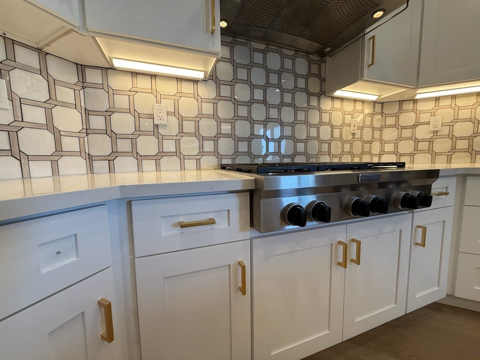 Soft close cabinetry and stainless steel appliances.