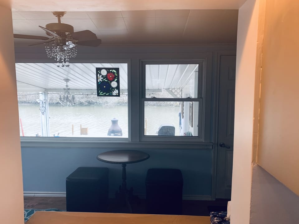 sunroom overlooking canal, watching birds, ducks, tortoise, canoeing, boating