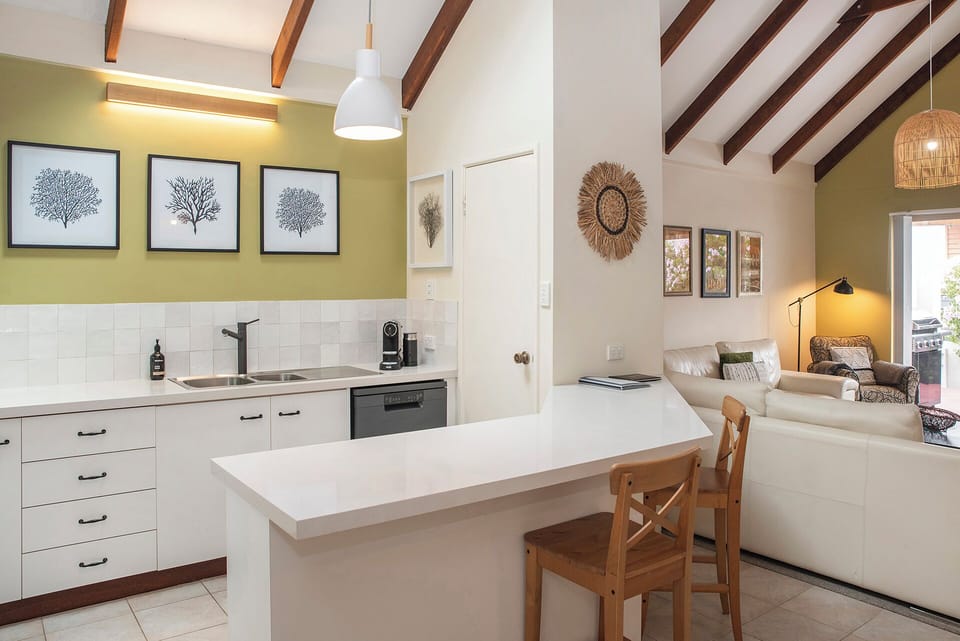 The kitchen is equipped with a Nepresso coffee machine.