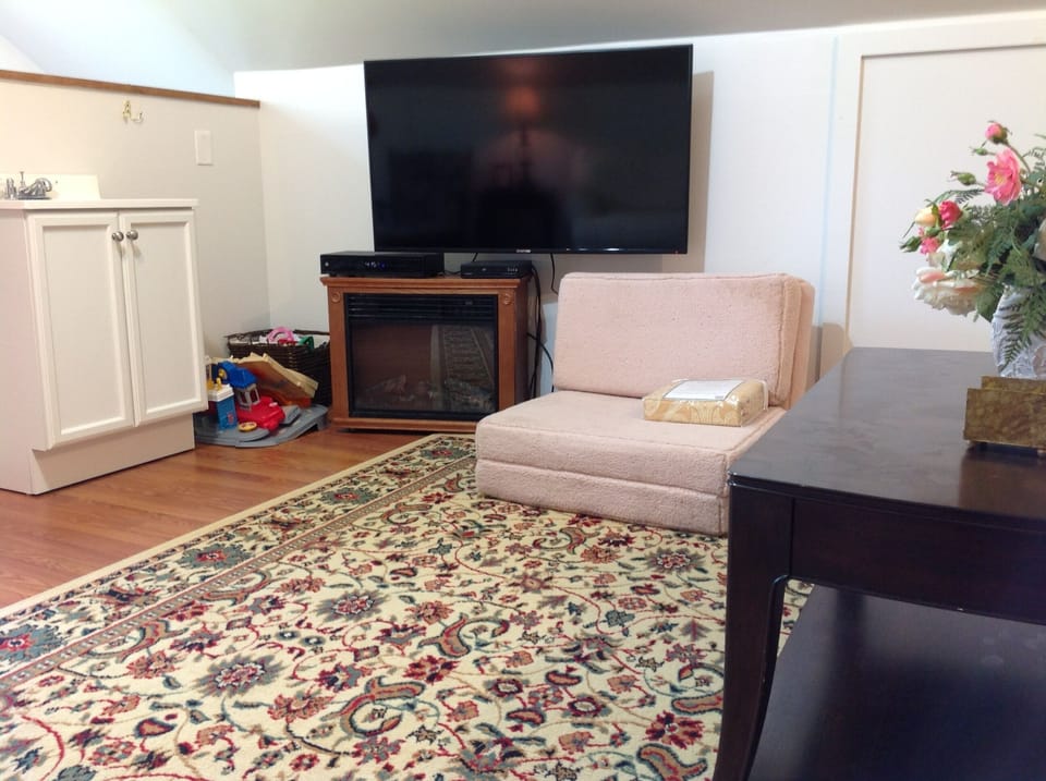 50" HD cable TV with DVD, twin folding chair to foam twin size bed