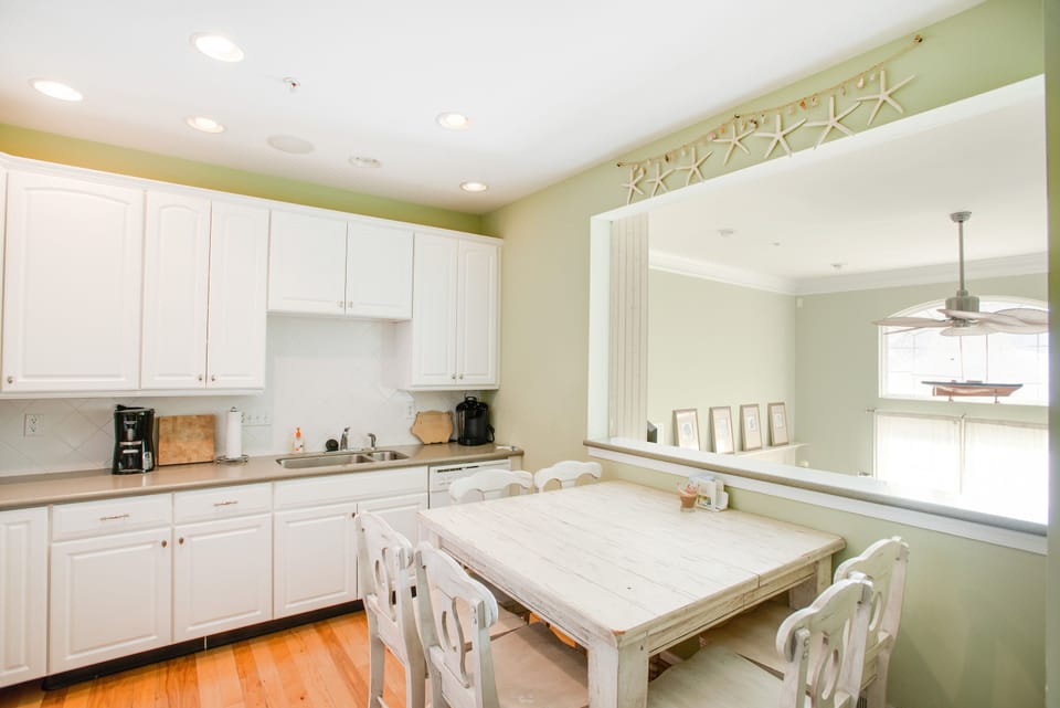 Kitchen.  Table has extra leaf that expands to seat more people. 