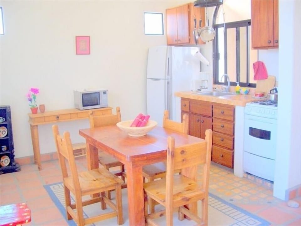 Mexican hardwood furniture in the kitchen.