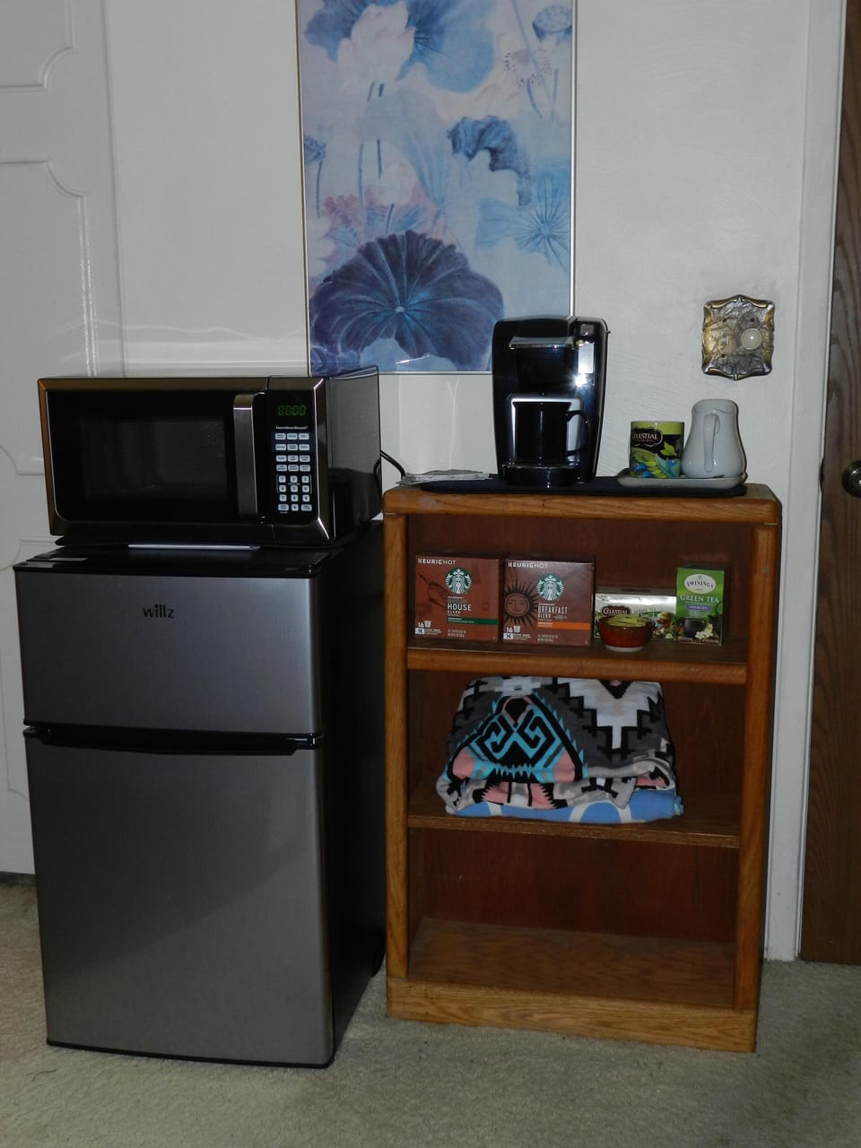 Frig, microwave, coffee maker and supplies, towels for pool