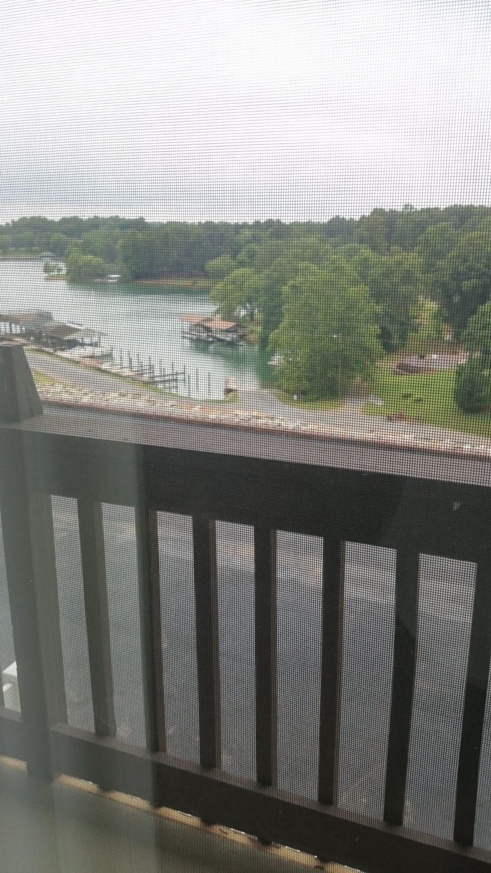 Look through the screened door to see your boat moored in one of the slips