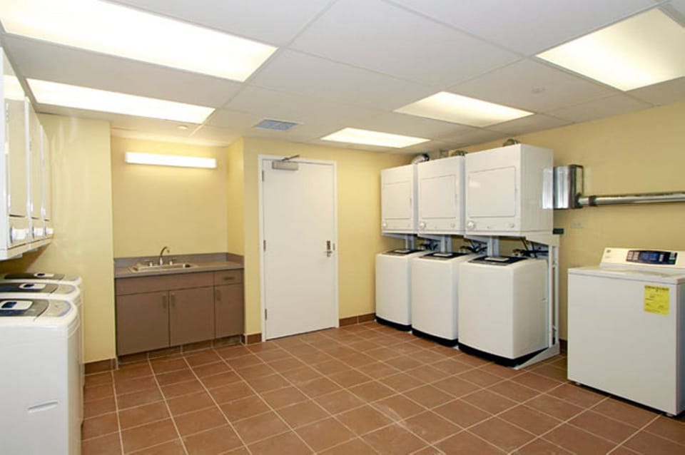 Free laundry facilities for guest use on the 4th floor
