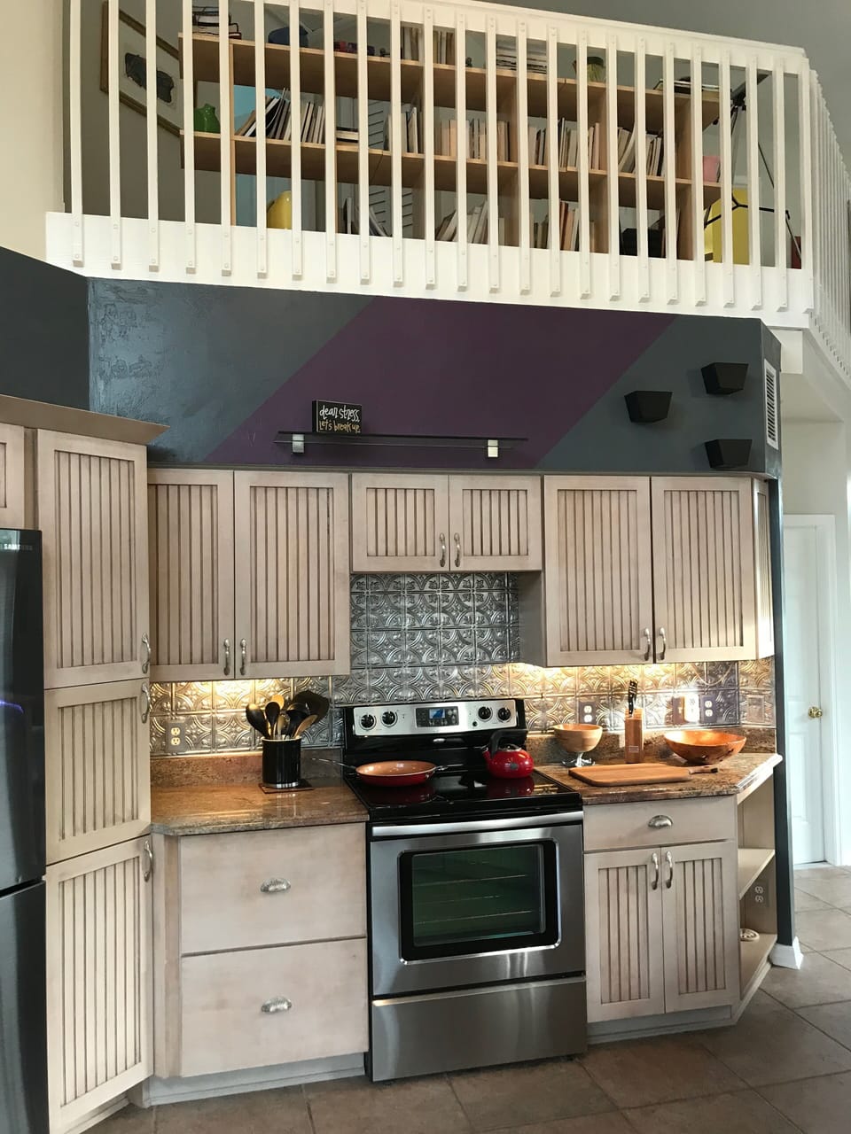 KITCHEN AND UPSTAIRS BALCONY
