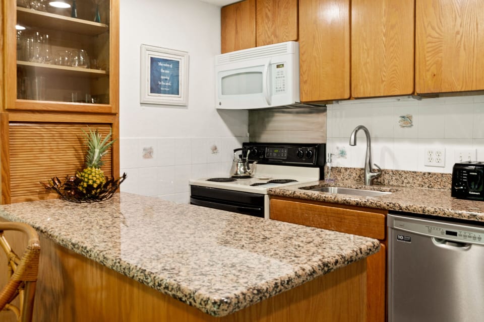 Fully equipped kitchen with granite countertops