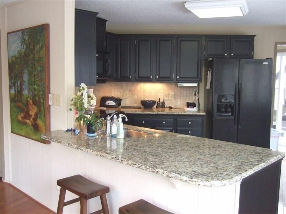Open Kitchen with granite countertops