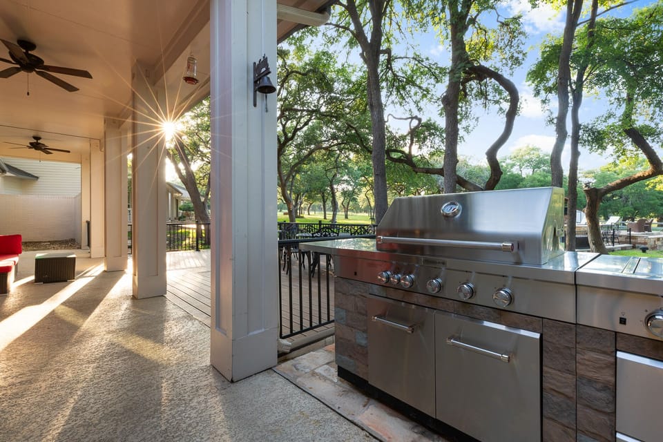 Off the kitchen and informal dining area is the propane barbecue grill and deck.
