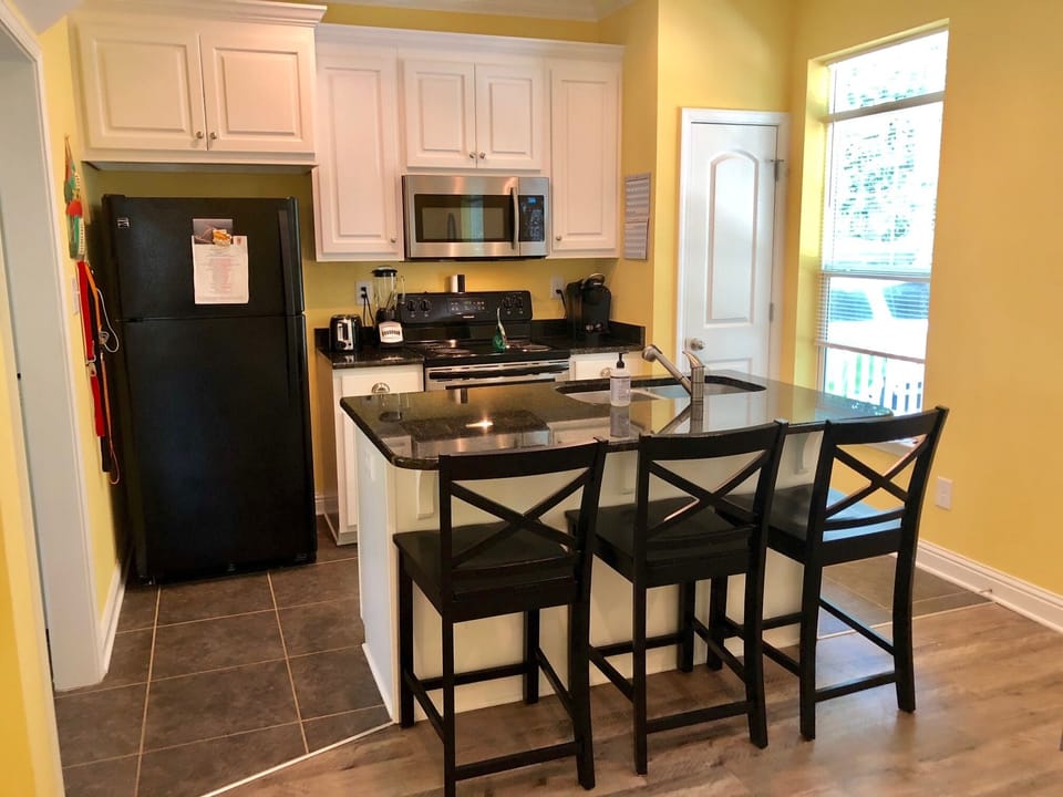 The kitchen. Cozy and cute. There's a washer and dryer just off the kitchen.