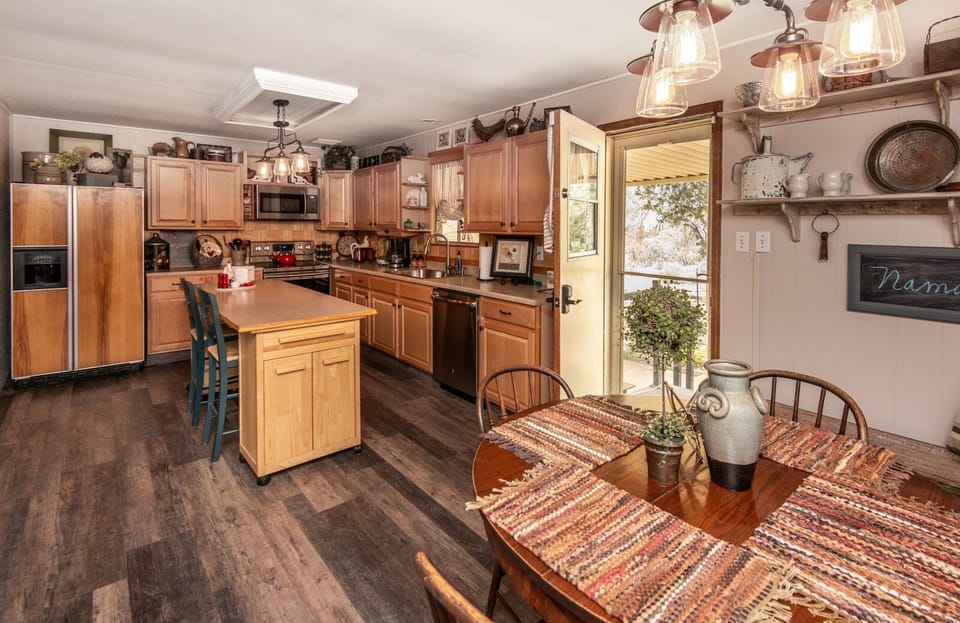 Front door entrance view with ample dining and counter space for dining.  