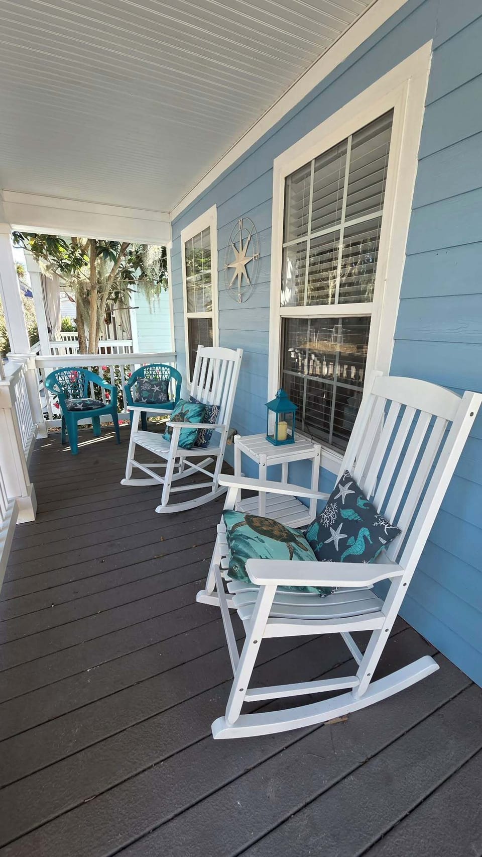 Watch the world go by from the covered front porch! 
