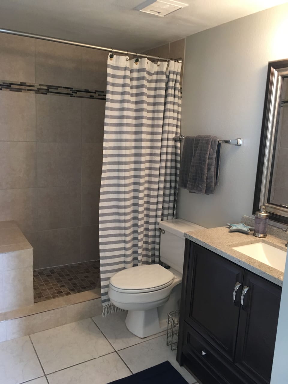 Huge bathroom with walk-in tiled shower