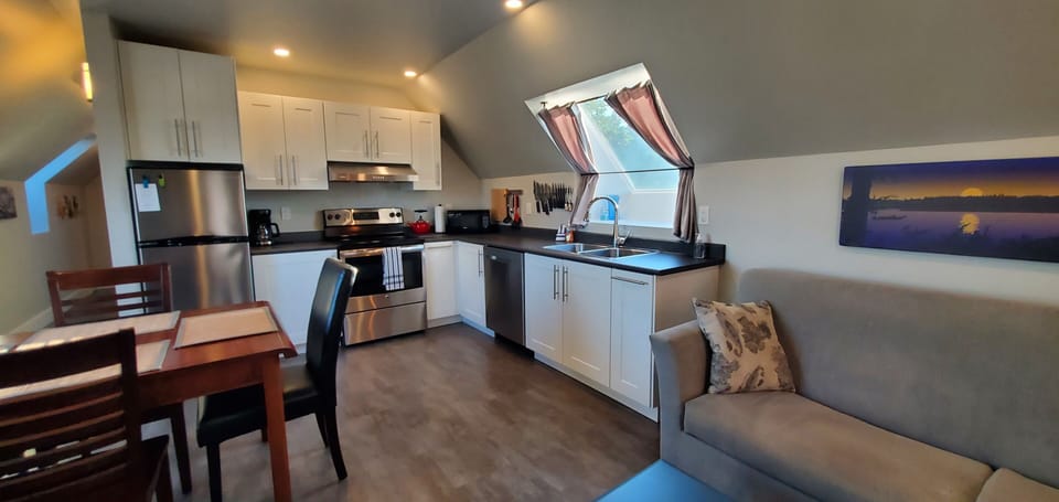 Fully equipped kitchen includes dishwasher and full size oven