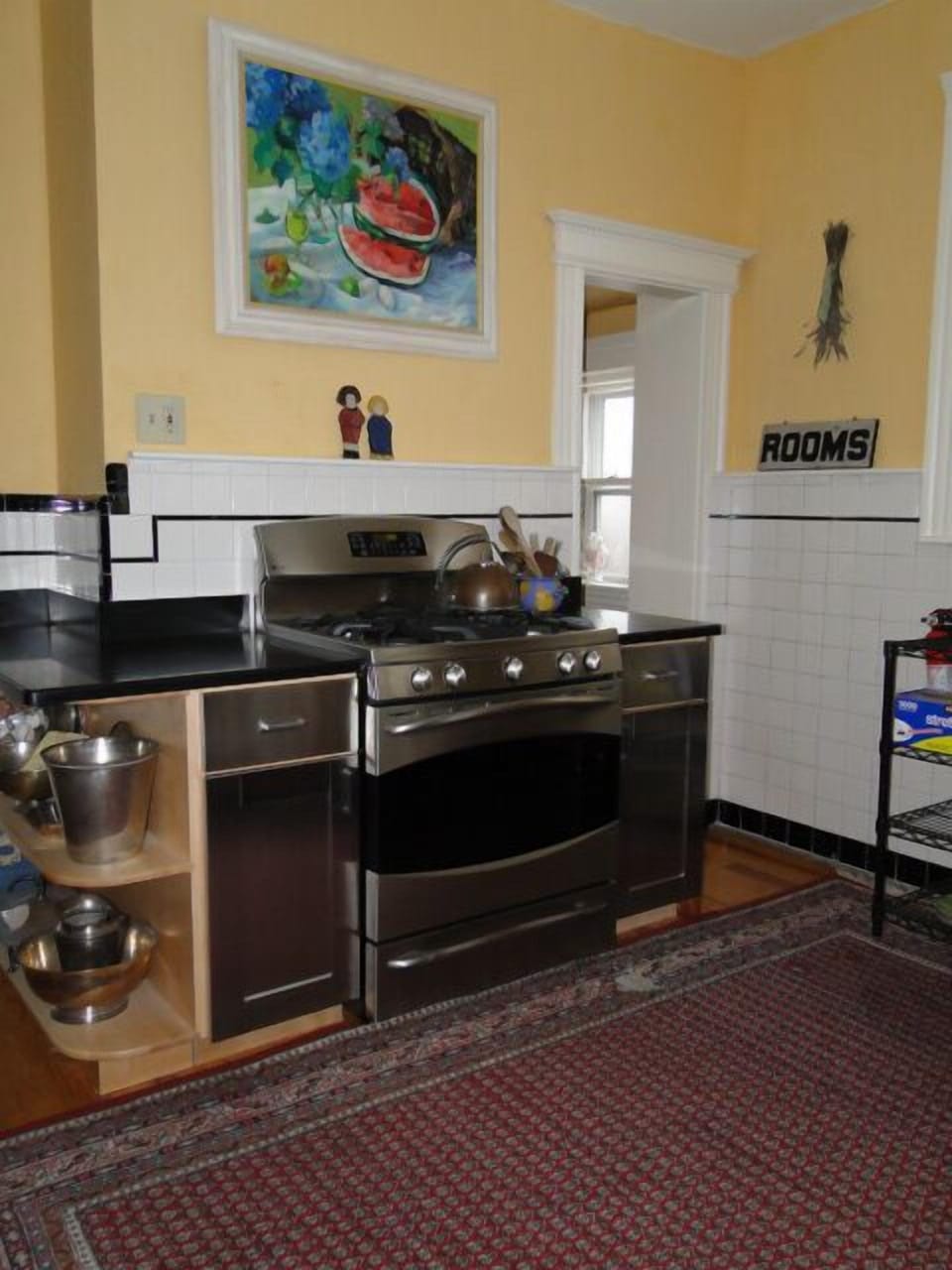 Stainless Kitchen with two adjacent pantries