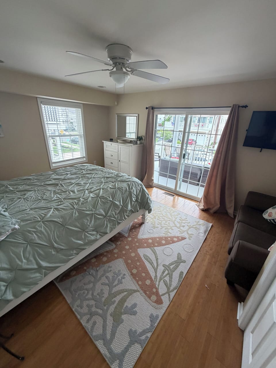 Primary Bedroom #2 with anew bathroom and twin sleeper sofa for the little ones.