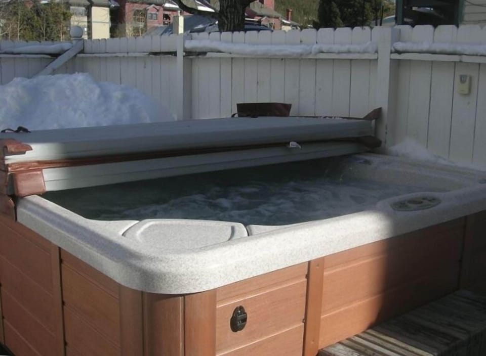 Large private hot tub in private yard.

