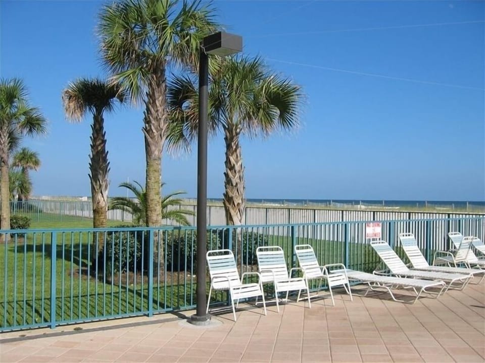 pool area plenty chaise loungers and chairs for everyone heated pool