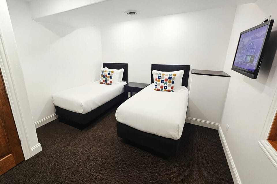 Downstairs | Fifth Bedroom | Twin Beds | Flat Screen TV