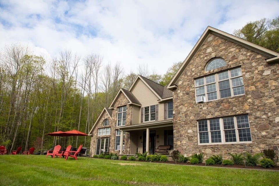 Make the most of the outdoor space with a picnic table, grill, and a selection of yard games, offering plenty of options for fun, relaxation, and outdoor dining.