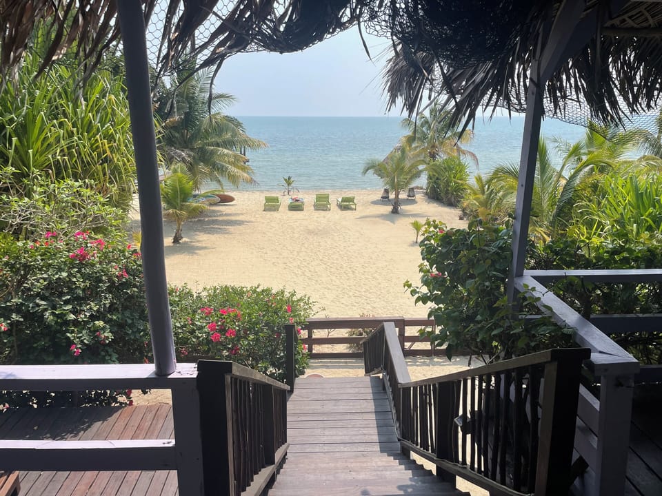 Stairs down from the balcony to private beach
