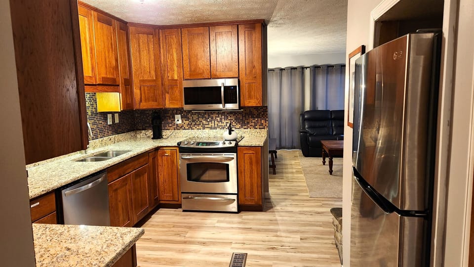 Kitchen - new granite countertops and flooring 2023