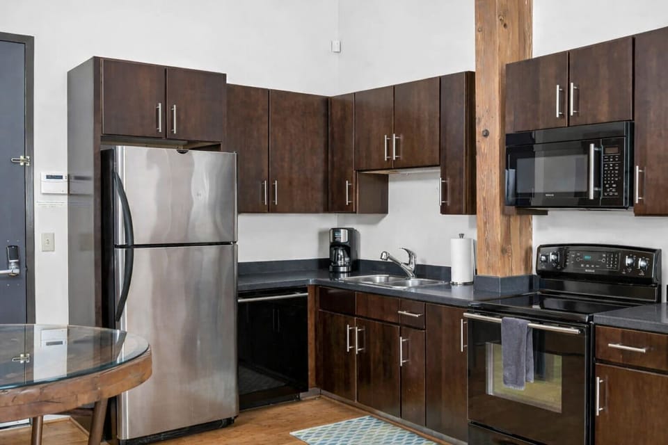 Full kitchen with standard coffee maker.